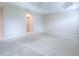Main bedroom with a large closet and neutral wall colors at 2410 Little Mountain Loop, The Villages, FL 32162