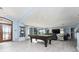 Bright game room with pool table, and lake view at 2537 E Crooked Lake Dr, Eustis, FL 32726