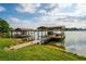 Two covered boat docks on the lakefront at 2537 E Crooked Lake Dr, Eustis, FL 32726