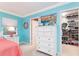 Bedroom with walk-in closet and dresser at 2537 E Crooked Lake Dr, Eustis, FL 32726