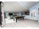Spacious game room with pool table and open layout at 2537 E Crooked Lake Dr, Eustis, FL 32726