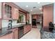 Well-equipped kitchen with double ovens and granite counters at 2537 E Crooked Lake Dr, Eustis, FL 32726