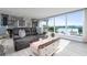 Living room with lake view and comfy seating at 2537 E Crooked Lake Dr, Eustis, FL 32726