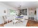 Bright dining room features a built-in hutch and hardwood floors at 2537 E Crooked Lake Dr, Eustis, FL 32726