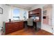 Home office with built-in desk and lake view at 2537 E Crooked Lake Dr, Eustis, FL 32726