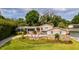 Beautiful home with landscaping and stone accents at 2537 E Crooked Lake Dr, Eustis, FL 32726