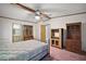 Bedroom with wooden furniture and carpeted floor at 25043 Bellevue, Leesburg, FL 34748