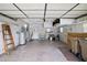 Attached garage with ample storage space and workshop area at 25043 Bellevue, Leesburg, FL 34748