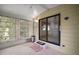 Sunroom with access to backyard and additional windows at 25043 Bellevue, Leesburg, FL 34748