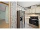 Kitchen with stainless steel appliances and ample storage at 25043 Bellevue, Leesburg, FL 34748