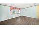 Bright bedroom with light walls and wood-look flooring at 25043 Bellevue, Leesburg, FL 34748