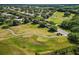 Aerial view of Plantation at Leesburg, showing homes, golf course, and landscaping at 25043 Bellevue, Leesburg, FL 34748