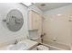 Clean bathroom with tub and updated vanity at 54 Aberdeen Cir, Leesburg, FL 34788