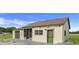 House exterior showcasing a charming design and landscaping at 13832 Bay Lake Rd, Groveland, FL 34736