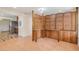 Bright dining area with wood room divider and tile floor at 13832 Bay Lake Rd, Groveland, FL 34736