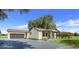 Newly renovated home with a two car garage and large yard at 13832 Bay Lake Rd, Groveland, FL 34736
