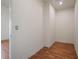 Empty closet with wood floor and white walls at 13832 Bay Lake Rd, Groveland, FL 34736
