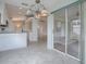 Breakfast nook with access to kitchen and view of the backyard at 536 Grand Vista Trl, Leesburg, FL 34748