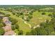 Aerial view of community and golf course at 25499 Hawks Run Ln, Sorrento, FL 32776
