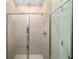 Spacious shower with glass enclosure and modern fixtures at 7711 Sw 74Th Loop, Ocala, FL 34481