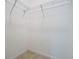 Walk-in closet with wire shelving at 17106 Gathering Place Cir, Clermont, FL 34711