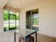 Spacious screened patio with paver floor and sliding glass doors at 17106 Gathering Place Cir, Clermont, FL 34711