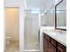 Bathroom with single vanity and shower at 17106 Gathering Place Cir, Clermont, FL 34711