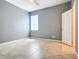 Bright bedroom with tile flooring, ceiling fan, and window coverings at 17106 Gathering Place Cir, Clermont, FL 34711
