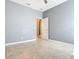 Spacious bedroom with tile flooring and access to other rooms at 17106 Gathering Place Cir, Clermont, FL 34711