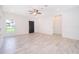 Open living room with modern front door and tile flooring at 561 Viceroy Ct, Kissimmee, FL 34758