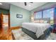Serene main bedroom with a king-size bed and views of the golf course at 2499 Nw 102Nd Blvd, Wildwood, FL 34785