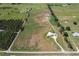 Aerial view of property with house and large lot at 2499 Nw 102Nd Blvd, Wildwood, FL 34785