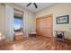 Bedroom with hardwood floors and built-in closet at 2499 Nw 102Nd Blvd, Wildwood, FL 34785