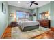 Spacious main bedroom with ample natural light and a tranquil atmosphere at 2499 Nw 102Nd Blvd, Wildwood, FL 34785
