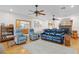 Spacious living room with fireplace and seating at 4114 Dove Valley Ln, Lady Lake, FL 32159