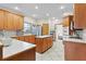 Spacious kitchen with island, ample cabinetry, and stainless steel appliances at 4114 Dove Valley Ln, Lady Lake, FL 32159