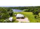 Lakefront home with large yard and shed at 4114 Dove Valley Ln, Lady Lake, FL 32159