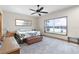 Main bedroom with lake view, ceiling fan and ample space at 4114 Dove Valley Ln, Lady Lake, FL 32159