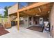 Backyard patio with wooden deck and stairs at 4114 Dove Valley Ln, Lady Lake, FL 32159