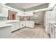 Bright kitchen with ample counter space and white appliances at 6435 Borg St, Leesburg, FL 34748