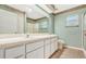 Clean bathroom with single sink vanity and shower/tub combo at 6435 Borg St, Leesburg, FL 34748