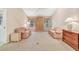 Living room with two sofas and a ceiling fan at 6435 Borg St, Leesburg, FL 34748