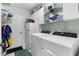 Bright laundry room, washer, dryer, and ample storage at 7151 Se 173Rd Arlington Loop, The Villages, FL 32162