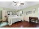 Spacious bedroom with wood floors and built-in storage at 7151 Se 173Rd Arlington Loop, The Villages, FL 32162