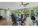 Casual dining area with glass-top table and garden views at 7151 Se 173Rd Arlington Loop, The Villages, FL 32162