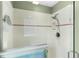 Walk-in shower with tiled walls at 7151 Se 173Rd Arlington Loop, The Villages, FL 32162