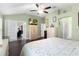 Bright bedroom with access to another room and hardwood floors at 7151 Se 173Rd Arlington Loop, The Villages, FL 32162