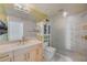 Bright bathroom, with walk-in shower, toilet and vanity at 155 S Court Ave # 1507, Orlando, FL 32801