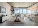 Elegant dining room with marble floors and a modern chandelier at 155 S Court Ave # 1507, Orlando, FL 32801