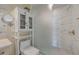 Bathroom with marble shower and white toilet at 155 S Court Ave # 1507, Orlando, FL 32801